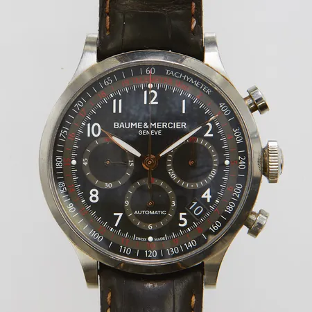 Herrur Baume Mercier Capeland, stål, 44mm, refnr: 65716, Refnr: 5543407, automat, datum, skadad läderband, original spänne, skadad boett,  manual, cert ej ifyllt skadad, box, ytterkartong. Vikt: 0 g