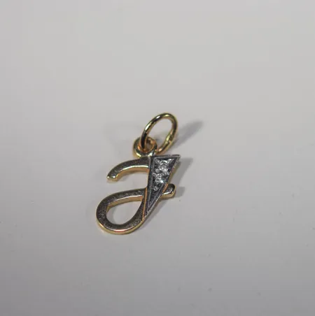 Hänge med liten diamant  L 2 cm, 18k, 0,8gr Vikt: 0,8 g