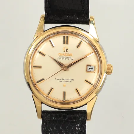 Armbandur Omega Constellation, Calendar, automatic chronometer, datum, referensnr:14393 2, calnr: 561, serienr: 17218885, guldtonad/stål, läderband, längd inklusive ur ca 22cm, originalask, missfärgningar på insidan av ask, defekt ask, lock har släppt, glapp i lås