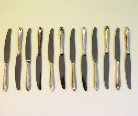 12 Dessertknivar, K. A, längd 17,5cm, 830/1000 silver, bruttovikt 311,7g Vikt: 311,7 g