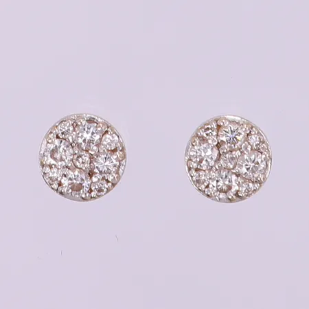 Ett par örhängen vitguld med diamanter, ca 10x0,01ct, 8x0,03ct, mått Ø6,5mm, snurrebussar ej guld. 18K Vikt: 1,5 g