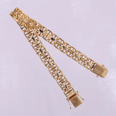 Armband X-länk med stav, längd 22cm, bredd 9,5mm, 18K.  Vikt: 34,4 g