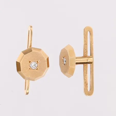 Ett par skjortknappar med diamanter 2x ca 0,02ct, K&EC, Göteborg, 1967, Ø10mm, med samtida etui, 18K guld.  Vikt: 3,9 g