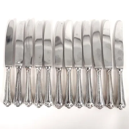 Tolv, bordsknivar, modell "Symfoni", MEMA, Lidköping, längd 19,5cm, slitage, stålblad och silver, bruttovikt 466,2g Vikt: 0 g