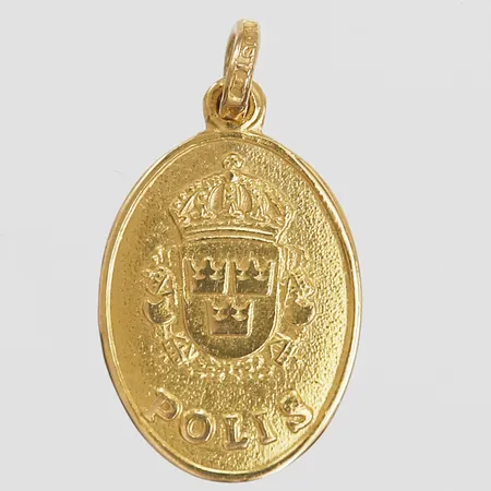 Hänge, höjd inkl. ögla: 24 mm, bredd: 13 mm, gravyr, 18K guld. Vikt: 2,5 g