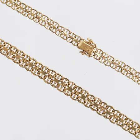 Collier, X-länk med stav, längd 48cm, bredd 6-9mm, kistlås med dubbla låsåttor, troligen tillverkad av Silvercarlson, Axel Carlson,. Stockholm 1968, 18K guld Vikt: 23,1 g