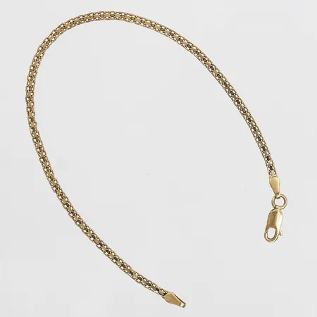 Armband, längd 19,5cm, bredd 2mm, skev, 18K guld Vikt: 3 g
