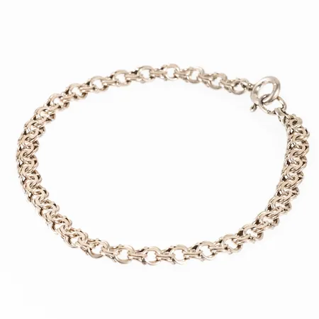 Armband Bismarck i silver (925/1000). Det är 4,5 mm brett, 18 cm långt och väger 4,2g. Stämplad NSE (NSE Guldvaru Aktiebolag i Köping) & 925. Springring.