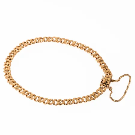 Armband Pansar i 18K guld. Det är 4,9 mm bred, 21,5 cm långt och väger 11,8g. Kistlås. Säkerhetskedja. Stämplad BOLIDENGULD, 18K & Kattfot. Slitna länkar närmast låset. 