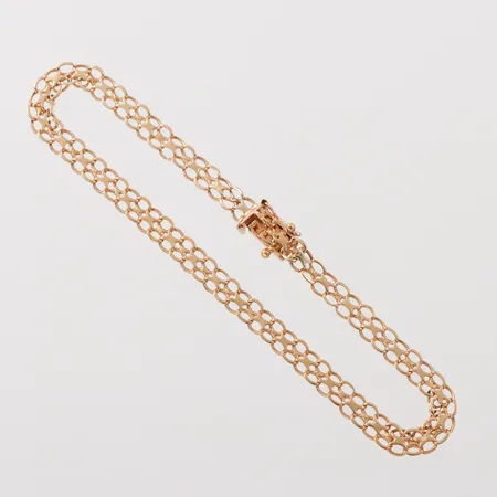 Armband X-länk, Kaplan Stockholm, 1 st låsåtta saknas, längd ca 21 cm, bredd 4.8 mm, 18k. Vikt: 6,5 g