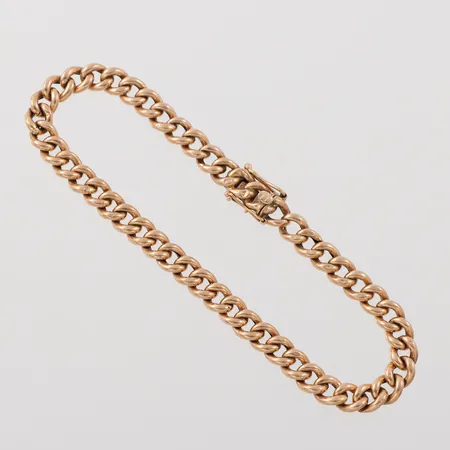 Armband, ihåligt med ojämnheter, slitage, längd ca 20.5 cm, bredd 5.8 mm, 18k. Vikt: 8,1 g
