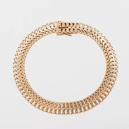Armband, Anetoft & Persson Guldsmedsfirma Stockholm 1962, längd ca 18.5 cm, bredd 7.8 mm, 18k. Vikt: 15,9 g