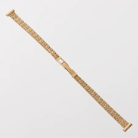 Armband till damur, längd ca 16 cm, bredd 5.5-6.2 mm, 18k. Vikt: 12,7 g