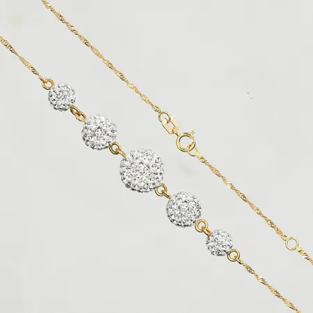 Collier med Swarovski-kristaller, Guldfynd, längd 41½-44½ cm, länkens bredd 1 mm, 18K. Vikt: 4 g