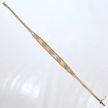 Armband, trefärgad, längd 17,5cm, bredd 2,6-6,6mm, något skadad, 18K Vikt: 8,1 g