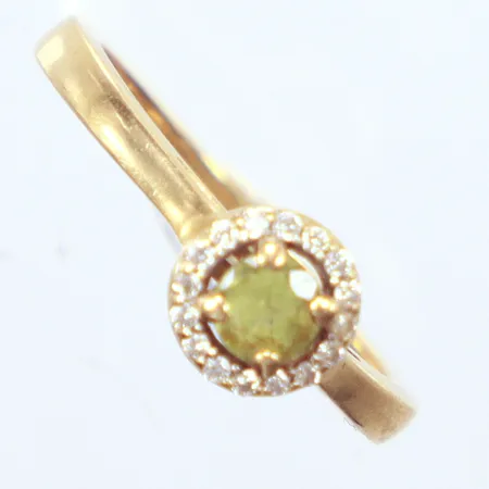 Ring, peridot, diamanter 15x0,005ct, Ø16¼, 18K Vikt: 2,4 g
