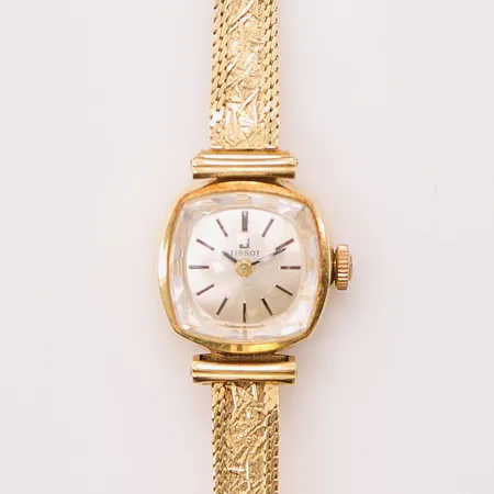 Damur Tissot 18K, 17mm, manuell, band i 18K, något skev länk, bruttovikt 19,9g.