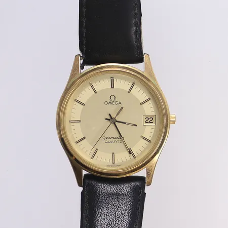 Herrur Omega Seamaster Quartz, Ø34mm, cal 1337, gulmetall/stål, ej funktionstestad, går ej troligen batteribyte, slitage, repa i glas, slitet läderband ej original