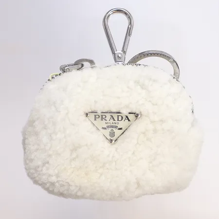 Necessär Prada, ca 9x7x3cm, med dustbag, tag och cert (ej ifyllt), art. 1NR011, Montone-bomull och nylon, något missfärgad, slitage på beslag