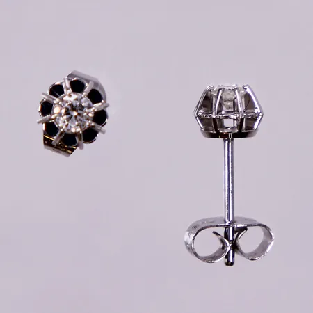 Ett par örhängen vitguld med diamanter ca 2x0,10ct, Ø ca 5mm, GFAB, 18K Vikt: 1,2 g