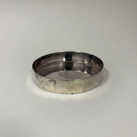 Flaskunderlägg, Ø10,5cm, Nydell Bengt, år 1999, 925/1000 Silver 159,4g.