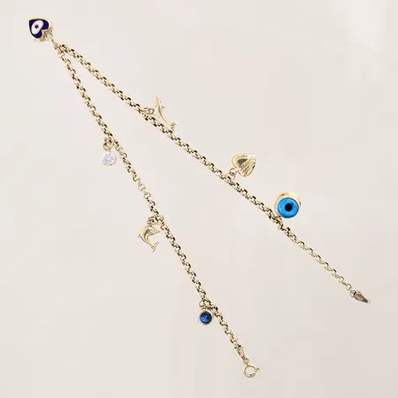 Vristlänk Ärtlänk med sju integrerade berlocker, längd 27cm, bredd 3mm, 14K  Vikt: 6 g