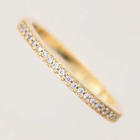 Ring med diamanter 24 x ca 0,005ct, stl 15½, bredd 2mm, 18K  Vikt: 1,9 g