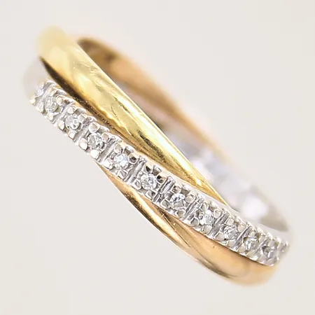 Ring, tvåfärgad, med diamanter 10 x ca 0,007ct, 8/8-slipade, stl 16¼, bredd 4mm, delvis vitguld, GFAB, 18K  Vikt: 2,9 g