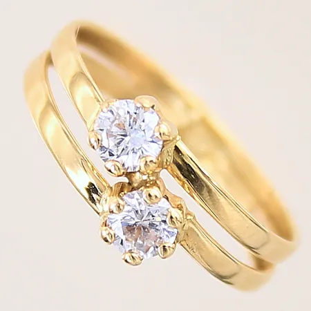 Ring med vita stenar, stl 17½, bredd 3,5-8mm, GHA, 18K  Vikt: 1,3 g
