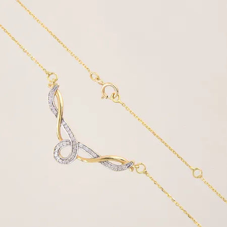 Collier Ankar med integrerat hänge med diamanter ca 44 x 0,005ct, ställbar längd 42/45cm, bredd 0,6mm, hängets mått: 18x34mm, fattning i vitguld, 18K  Vikt: 3,2 g