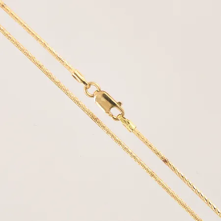 Kedja, längd 44,5cm, bredd 1,1mm, smärre bucklor, 18K Vikt: 6,3 g