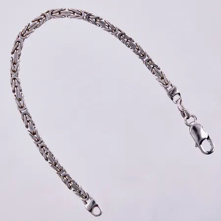Armband, längd: ca 19,5cm, bredd: ca 4mm, bucklor på öglan vi lås, 925/1000 silver Vikt: 19,3 g Vikt: 18,6 g