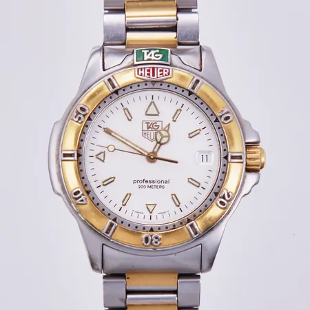Herrur Tag Heuer, Professional, 200 meter, ref: WF1120-0, quartz, datum, batteribyte krävs, stål/doublé, Ø 36-38mm 