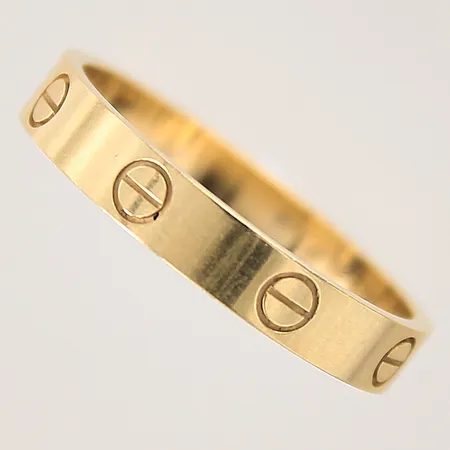 Ring, Cartier Love, stl 19/60, bredd 4mm, serie-nr: SUY858, certifikat från 2023, kvitto, följesedel från Cartier, repig, 18K Vikt: 3,8 g