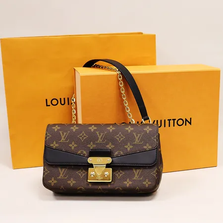 Väska Louis Vuitton Marceau NM MNG Noir, brun monogramcanvas med svart skinn i locket, guldfärgad kedja och lås, mått 24.5 x 15 x 6.5 cm, kvitto Louis Vuitton Amagertorg Köpenhamn November 2022, bra skick med mindre bruksspår, dustbag, box och påse.