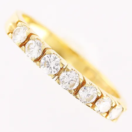 Ring, 7st diamanter 0,49ctv, stl 18¾, bredd 2,5mm, 18K Vikt: 3,6 g
