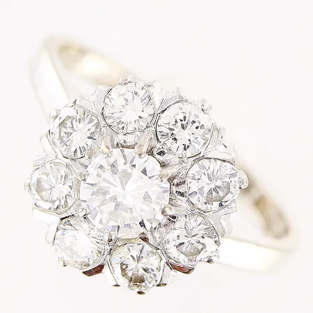 Ring, diamanter 1 x ca 0,45ct, 8 x ca 0,10ct, stl 16½, bredd 2-12mm,  Petterssons Eftr Juvelerar Ab Joh, vitguld, 18K   Vikt: 3,9 g