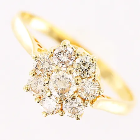 Ring, diamanter 1 x ca 0,15ct, 6 x ca 0,07ct, något tonade, stl 18¾, bredd 2-10mm, 18K Vikt: 2,5 g