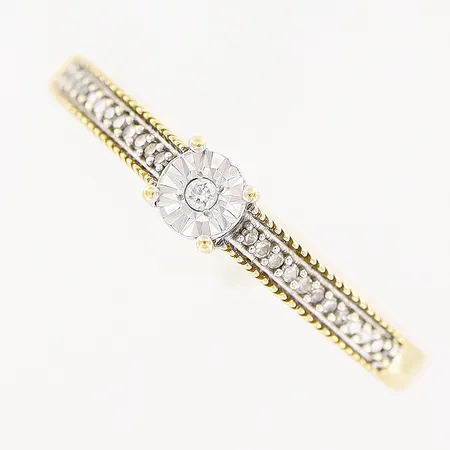 Ring, diamanter 23 x ca 0,005ct, stl 16¾, bredd 2-3,5mm, GHA, 18K Vikt: 2,1 g
