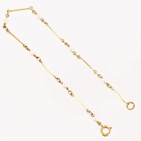 Armband med odlade saltvattenspärlor Ø3mm, 18,5cm, bredd 0,5mm-3mm, skevheter på stavar, slitage, 18K. Vikt: 2,2 g