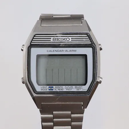 Herrur Seiko Calendar-Alarm 33x40mm, ref nr A354-400A snr 064659, quartz (går ej) med stållänk (original) 