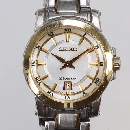 Damur Seiko Premier Ø22mm ref nr 7N82-0HP0 snr 380478 quartz (går ej troligen batteribyte), datum, stållänk med slitage, 2000-tal