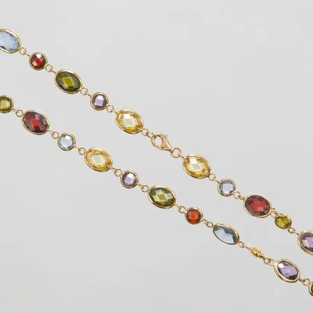 Collier med syntetiska blå spineller samt cubic zirconia och glas i övriga färger, längd: 45,5cm, bredd: 6,5mm, GHA, 18K Vikt: 16,5 g