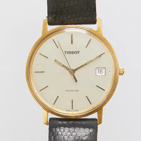 Herrur Tissot Seastar, 18K, opersonlig gravyr, repigt glas, datum, skadat läderband, defekt bygelspänne, etui 