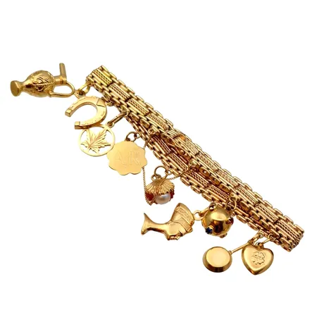 Armband 14K med berlocker 18K guld, längd 19 cm, bredd 8 mm,   Vikt: 37,1 g
