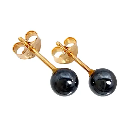 Örhängen, 18K guld, Hematit Ø 4,3 mm, ploppar med tillverkarstämpel SJ, mycket fint skick, stenar utan anmärkning Vikt: 0,7 g