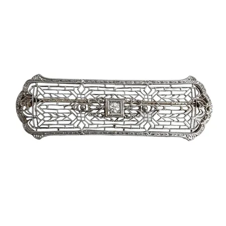 Brosch, 14K guld, fint filigranarbete, Diamant 0,05ct, längd 47 mm, bredd 13-15 mm, fint skick Vikt: 4,3 g