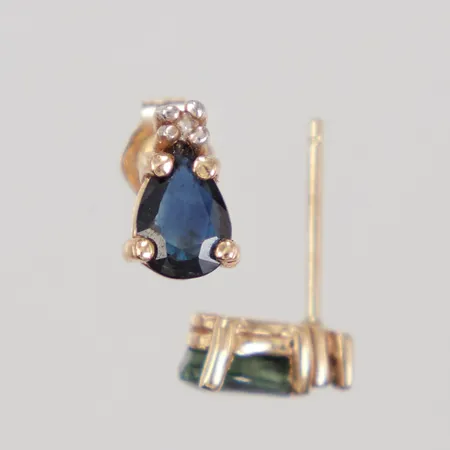 Ett par örhängen, 7,6x5mm, diamanter ca 2x0,01, blå sten, ena stopp saknas, 14K,  Vikt: 1 g