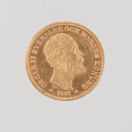 Guldmynt Sverige, 10 Kronor Oscar II 1883, Ø18 mm, 21,6K Vikt: 4,5 g