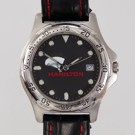 Herrur, Ø36mm, kvarts, reklamklocka för för filmen Hamilton 1998, märkt Moviola, sponsored by Tag Heuer, läderband, skadad läderögla, batteribyte krävs.